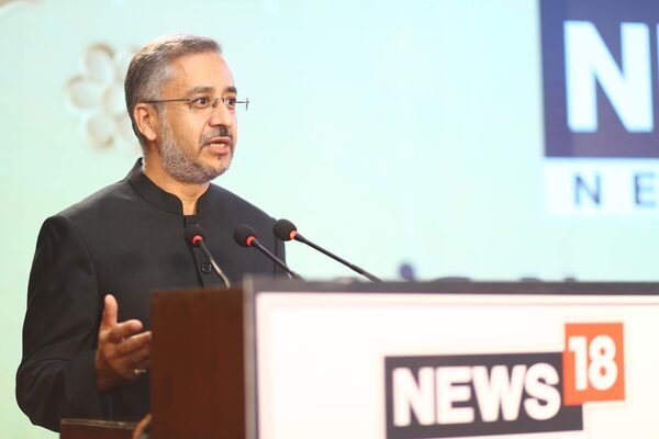 Avinash Kaul speaking at a News18 event