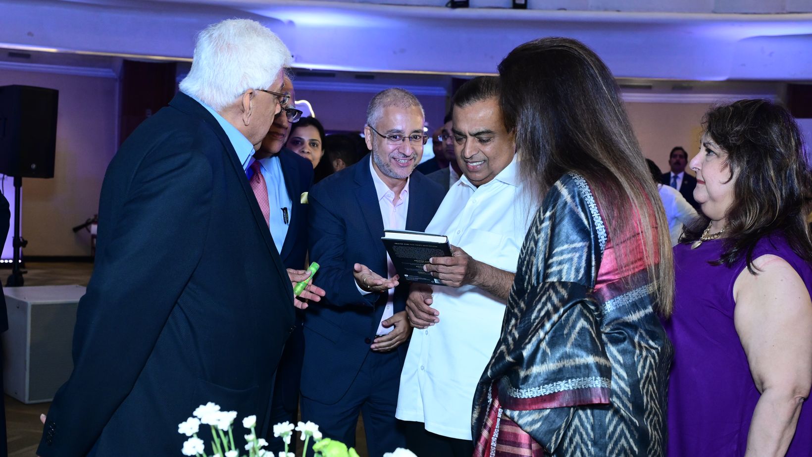 Mukesh Ambani reading The Next Mountain