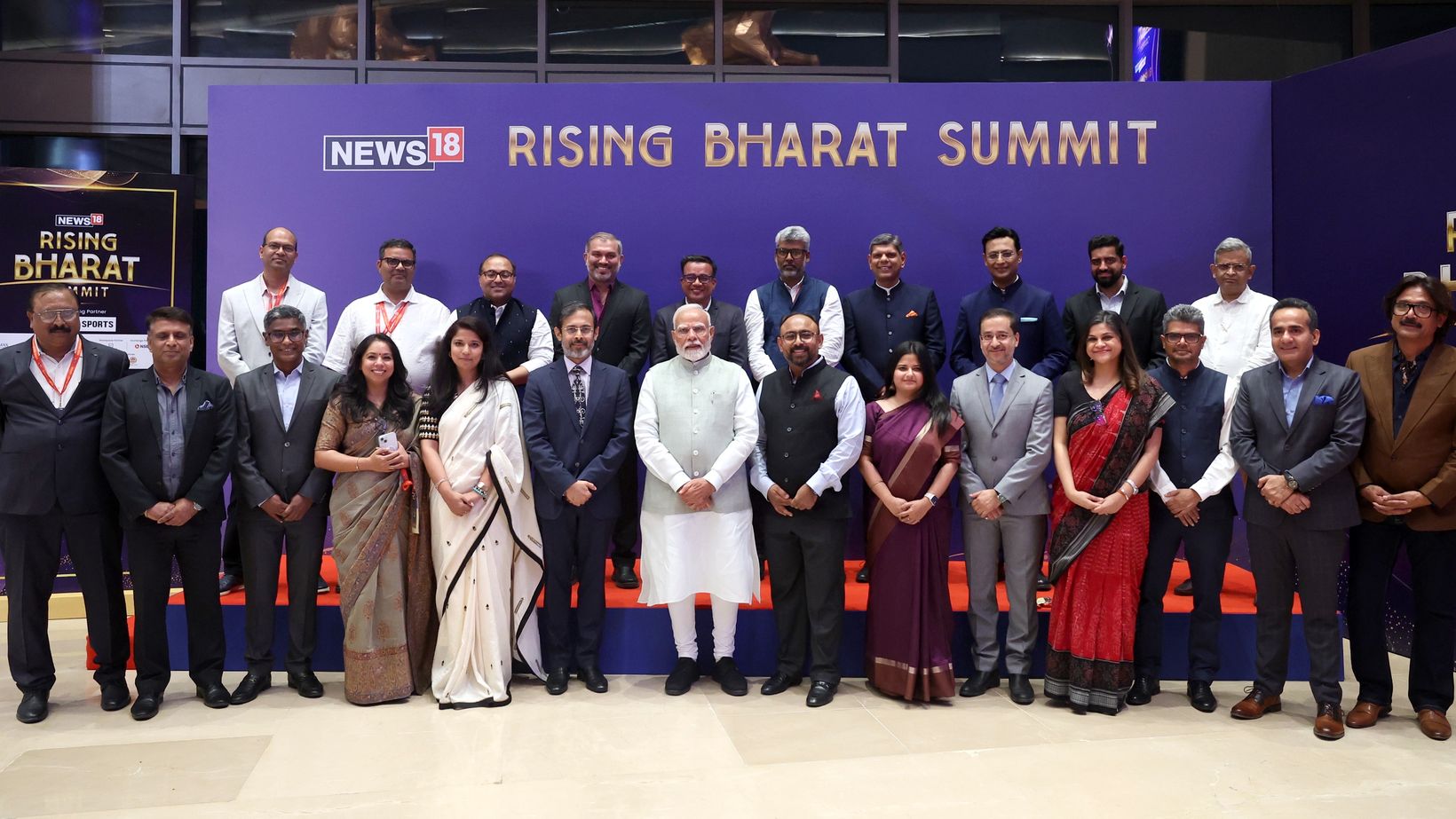 Avinash Kaul with Prime Minister Narendra Modi and guests at the News18 Rising Bharat Summit 2025